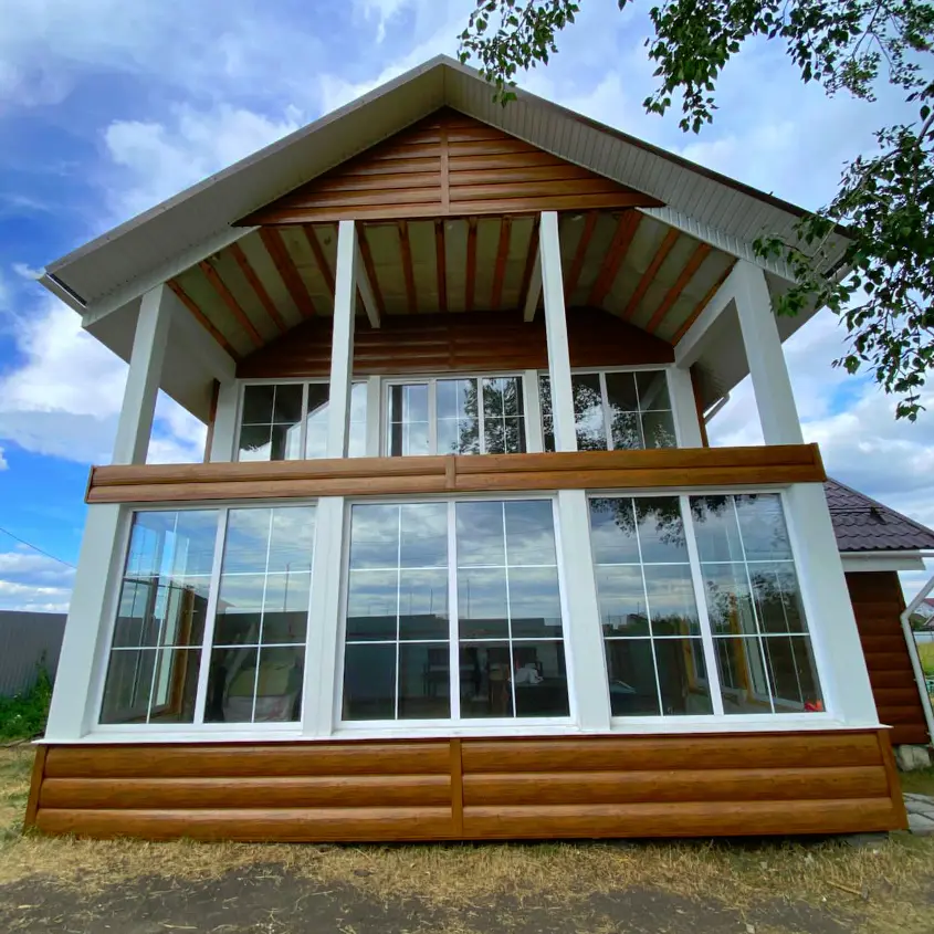 Фото 2 фасад из металлосайдинга Бревно Рубленое 4D Орех 3D Printech